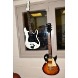 TWO ENCORE ELECTRIC GUITARS including a Les Paul type and a 60's style with two soap bar type