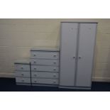 A MODERN TWO DOOR WARDROBE, a matching chest of five drawers and a three drawer beside chest (3)