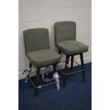 TWO MODERN GREEN UPHOLSTERED SWIVEL BAR STOOLS, (one chair with a single cut on seat pad)
