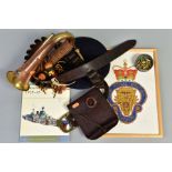 A SELECTION OF ITEMS, to include a brass military bugle with blue, orange and yellow tassels, a