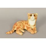 A MIKE HINTON POTTERY RESTING CAT, ginger colourway with glass eyes, signed to base and No15,