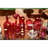 A COLLECTION OF VICTORIAN CRANBERRY AND CLEAR GLASSWARE, including six cream jugs, five small