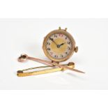 A WATCH AND TWO BROOCHES, the Swiss made watch movement of circular design with a gold and cream