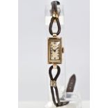 A LADIES 9CT GOLD ROLCO WRISTWATCH with leather strap, approximate gross weight 8.4 grams