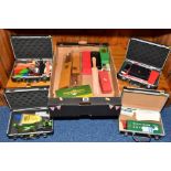 FOUR SMALL CASES AND A BOX OF SHARPENING STONES, and a small quantity of expedition/camping utensils