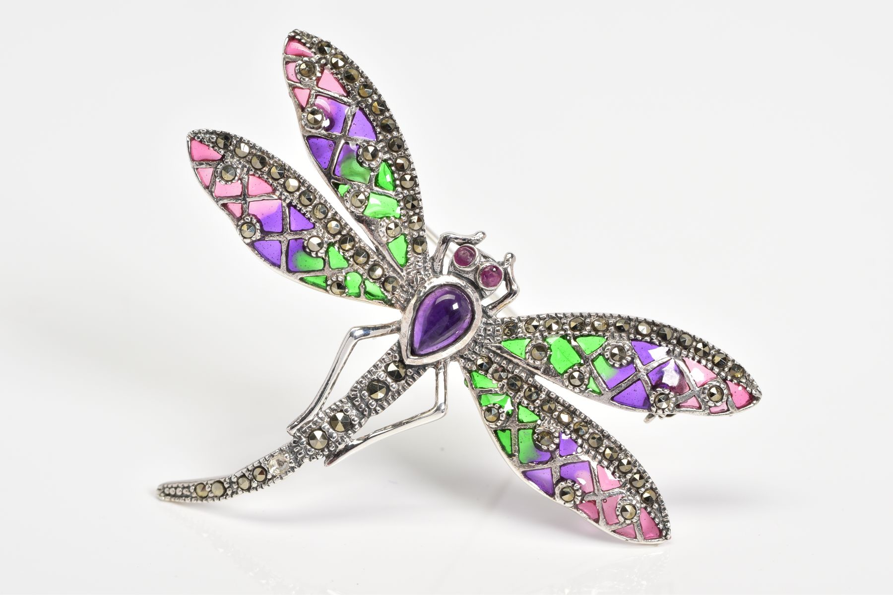 A PLIQUE A JOUR BROOCH, in the form of a dragonfly with pink, purple and green enamel wings, an