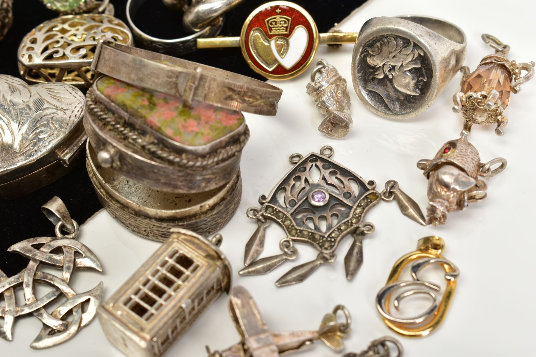 A SELECTION OF ITEMS, to include eight charms such as an owl, boat, plane etc, five pendants such as - Image 3 of 3