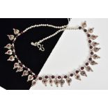 A SILVER GARNET NECKLACE, designed with a beaded silver chain with a row of round garnet beads