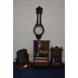 AN EDWARDIAN MAHOGANY BEVELLED BATHROOM MIRROR, with a hinged storage compartment, together with