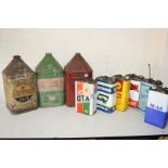 A COLLECTION OF NINE CLASSIC OIL CANS from brands such as Newton Oils, Castrol Gtx, Mobil, Shell etc