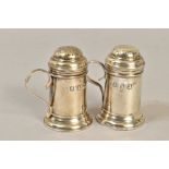 A PAIR OF GEORGE V BRITANNIA SILVER KITCHEN PEPPER POTS, domed pull off cover, 'S' scroll handle,