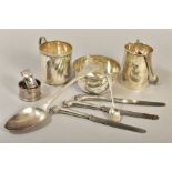 A PARCEL OF SILVER, including a christening mug, napkin ring and bowl, engraved initials and