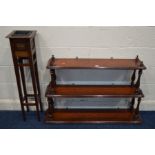 A VICTORIAN STAINED PINE GRADUATING THREE TIER WALL SHELF with turned uprights, width 114cm x