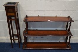 A VICTORIAN STAINED PINE GRADUATING THREE TIER WALL SHELF with turned uprights, width 114cm x