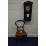 AN EARLY 20TH CENTURY OAK WALL CLOCK (two winding keys) and a late Victorian walnut chair (2)
