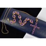 AN AMETHYST SET PENDANT AND BRACELET, the pendant in the form of a cross set with nine oval cut