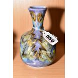 A COBRIDGE TRIAL VASE, dated to the vase 18-5-00, blue and yellow pattern on mauve ground,