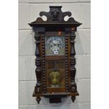 A LATE 19TH/EARLY 20TH CENTURY MAHOGANY WALL CLOCK (winding key)