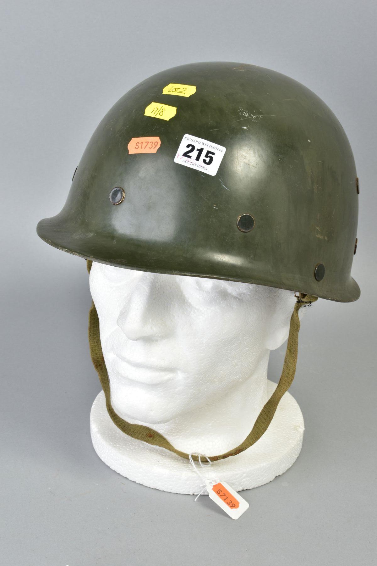 GREEN COLOURED US MILITARY HELMET (M1) but made of resin, with liner chin strap etc, possibly re-