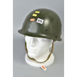 GREEN COLOURED US MILITARY HELMET (M1) but made of resin, with liner chin strap etc, possibly re-