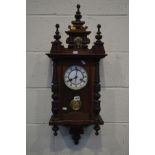 AN EARLY 20TH CENTURY WALNUT VIENNA WALL CLOCK, height 84cm