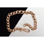 A CURB LINK BRACELET, a slightly graduated link bracelet with each curb link stamped 9.375,