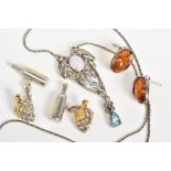 A SELECTION OF ITEMS, to include a pair of white metal oval amber earrings with post and scroll