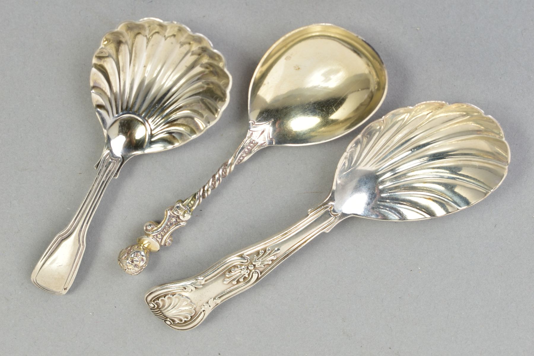 THREE SILVER CADDY SPOONS, to include a Victorian spoon with a cherub to the end of the handle and a - Image 3 of 3