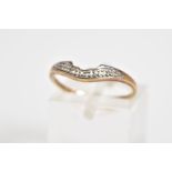 A 9CT GOLD DIAMOND RING, of V shape design, set with a row of single cut diamonds, to the plain