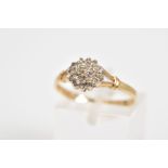 A 9CT GOLD DIAMOND CLUSTER RING, set with nineteen single cut diamonds to the bifurcated shoulders