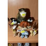 A GROUP OF POTTERY ANIMALS, TO INCLUDE a Beswick Beaver No 1943 and a cygnet No1686, a Russian