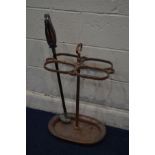 A CAST IRON UMBRELLA STAND