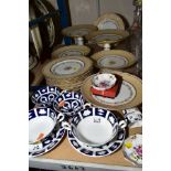 A CONTINENTAL CHINA DESSERT SERVICE having gilt decoration to the wavy beige rim, inner stencilled