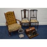 AN EARLY TO MID 20TH CENTURY MAHOGANY ROCKING CHAIR, together with an oak cased Singer sewing