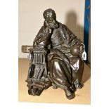 A 20TH CENTURY BRONZE FIGURE of a seated pensive scholar looking at a globe on his knee, approximate