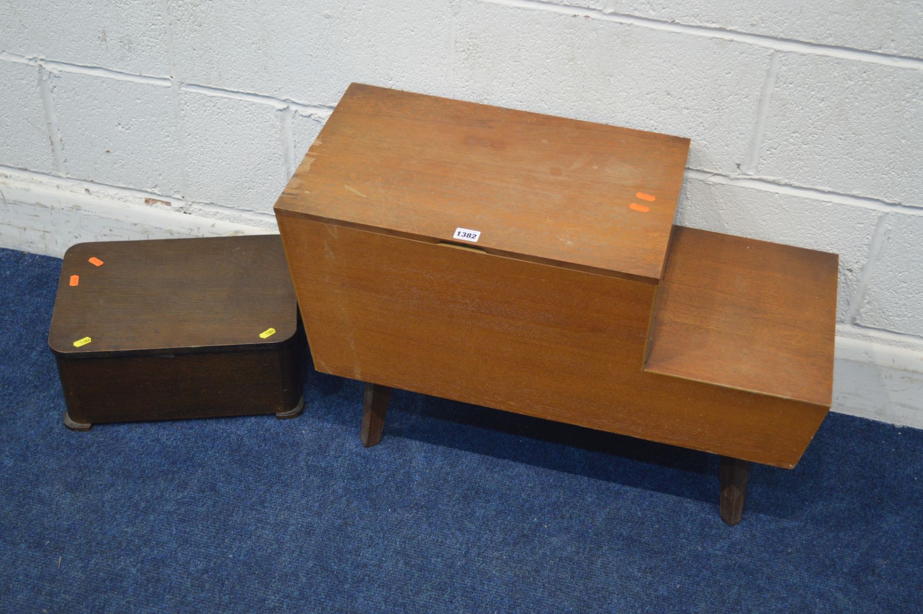 A MID 20TH CENTURY TEAK STEPPED WORK/SEWING BOX with two drawers (minor veneer damage) together with