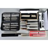 A SELECTION OF PENS, to include four Parker fountain pens, a Sheaffer fountain pen, together with