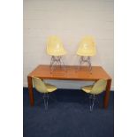 A SET OF SIX CHARLES AND RAY EAMES STYLE EIFFEL CHAIRS and a modern wooden rectangular extending