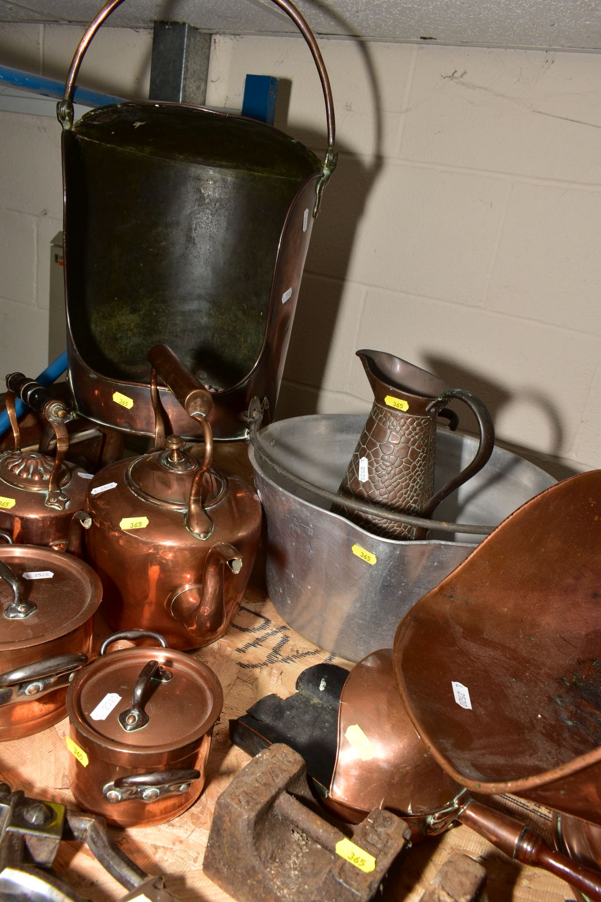 A GROUP OF METALWARE, comprising of three graduated twin handled copper pans with covers, two copper - Image 4 of 5