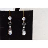 A PAIR OF SILVER GILT DROP EARRINGS, each drop pendant designed with a circular cabochon moonstone