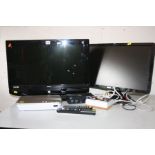 A GOODMANS LD2357D 23'' TV together with a Dell S2409WB 24'' monitor, a Humax freeviewplay, an