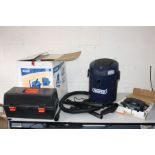 A DRAPER 20LTR WET AND DRY VACUUM CLEANER, with original box, a toolbox with tools and a Black &
