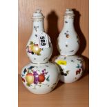 A PAIR OF LATE 19TH CENTURY MEISSEN DOUBLE GOURD SHAPED VASES AND COVERS, gilt rims and painted with