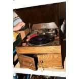 A DULCEOLA WIND UP TABLE TOP RECORD PLAYER with a box of 78's vinyl records