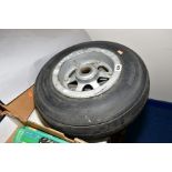 AN ALUMINIUM AIRCRAFT WHEEL WITH DUNLOP TYRE, wheel stamped with various codes ASSY AH9366, SS 8,