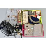 A SELECTION OF ITEMS, to include a red jewellery travel case filled with various costume earrings, a
