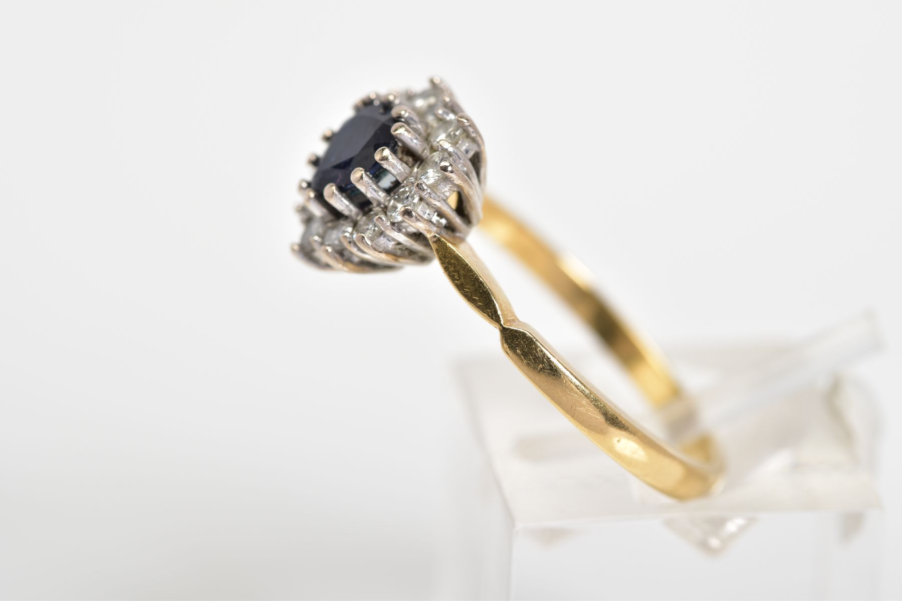 AN 18CT GOLD CLUSTER RING, set with a central heart shape sapphire with a round brilliant cut - Image 2 of 3