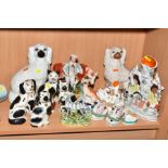 A GROUP OF STAFFORDSHIRE POTTERY FLAT BACKS, spill holders, pen stands and figures including a