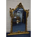 A 20TH CENTURY GILT WOOD OVERMANTEL MIRROR with foliate scrolls decoration, 114cm x 148cm