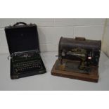 A VINTAGE CASED CORONA MODEL S GREEN ENAMEL TYPEWRITER, together with a distressed oak cased